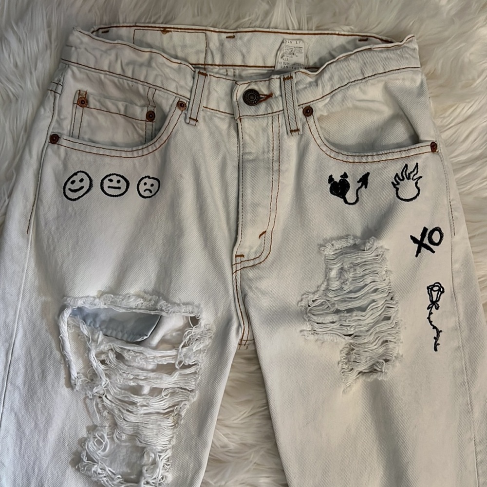 White “Inked” distressed Levi’s